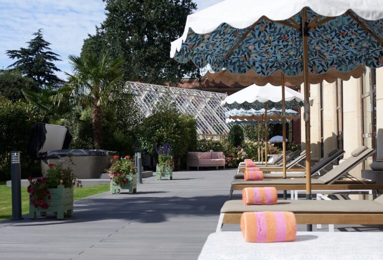 Terrace with parasols and sun loungers, Stoke Park