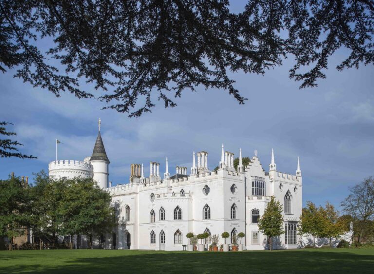 The house glimpsed across the garden, framed by the branches of a mature cedar, Strawberry Hill House