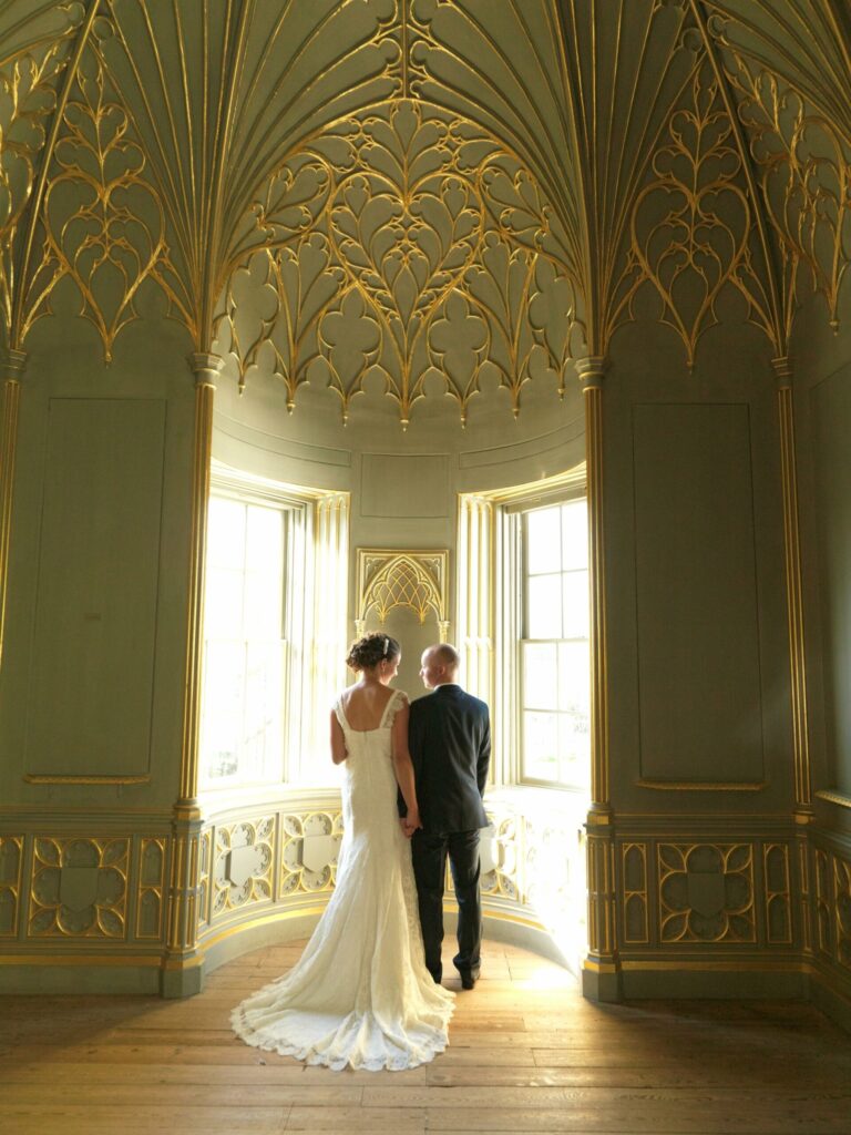 A couple in the gold-vaulted bay window of the Round Drawing Room, Strawberry Hill House