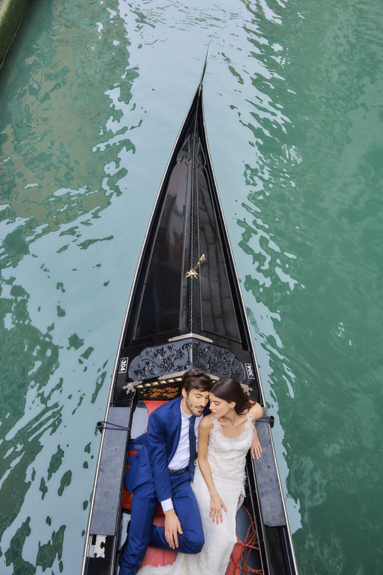A bride and groom in a gondola seen from above, Venice, Stuart Wood Photography