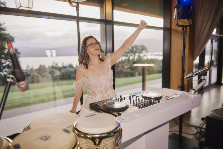 The bride taking a turn on the decks at the evening party, Boturich Castle, Stuart Wood Photography