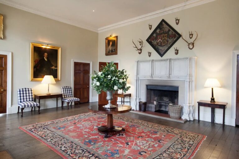 The Drawing Room with Fireplace and Antiques at Stubton Hall, Stubton Hall