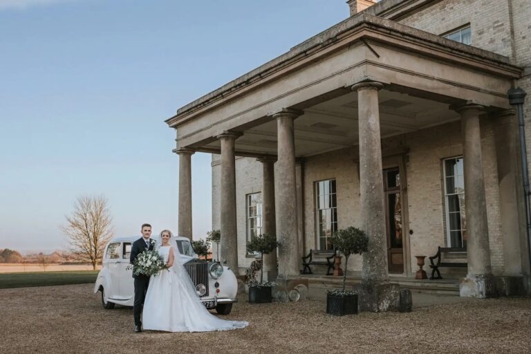 A Couple with a Classic Car Outside Stubton Hall, Stubton Hall