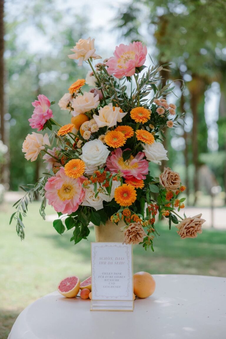 Pink and orange flowers in a welcome arrangement at Castello di Spessa, Studio Fotografico Bacci
