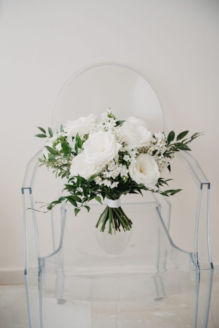 The bouquet, set down on a clear chair, Studio27 by Andreas Politis Photography and Cinematography
