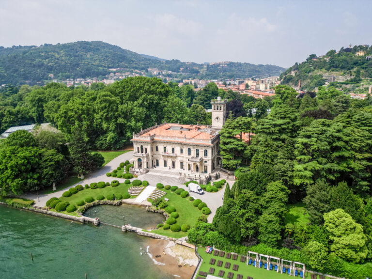A lakeside villa, its formal gardens and harbour on Lake Como from the air, Suellen Fernandes Weddings & Celebrations