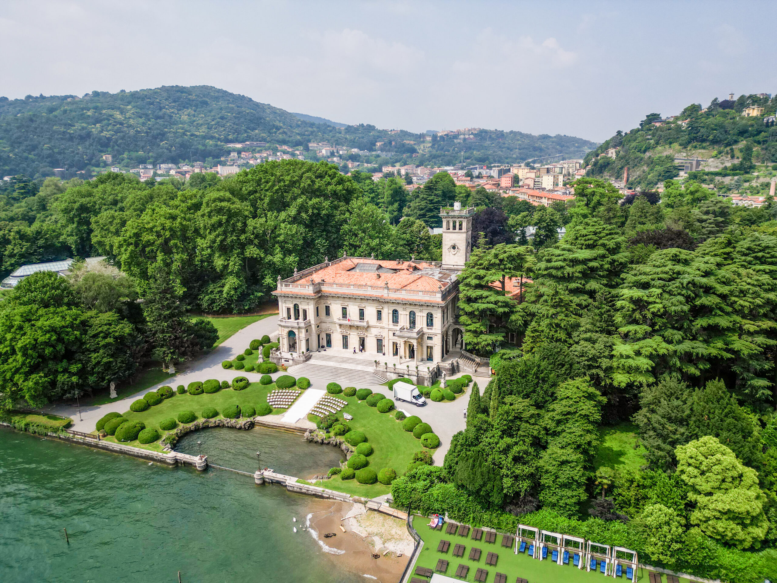 A lakeside villa, its formal gardens and harbour on Lake Como from the air, Suellen Fernandes Weddings & Celebrations