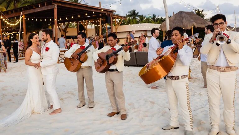 Mariachi band playing for the couple on the sand, SunHorse Weddings