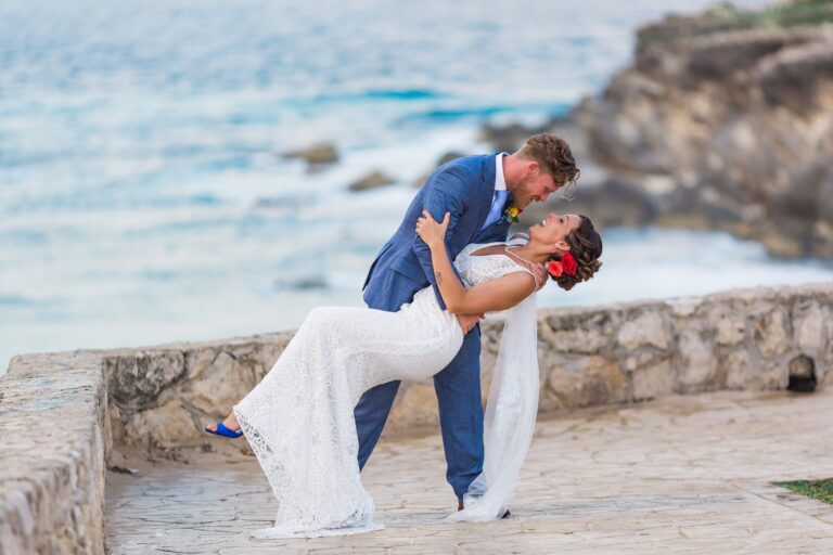Couple on the rocky shoreline of the island, SunHorse Weddings