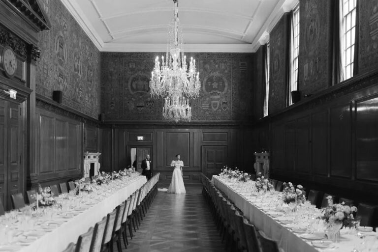 The long reception table, set beneath a chandelier, The Ned, Sweet Pea Floral Design