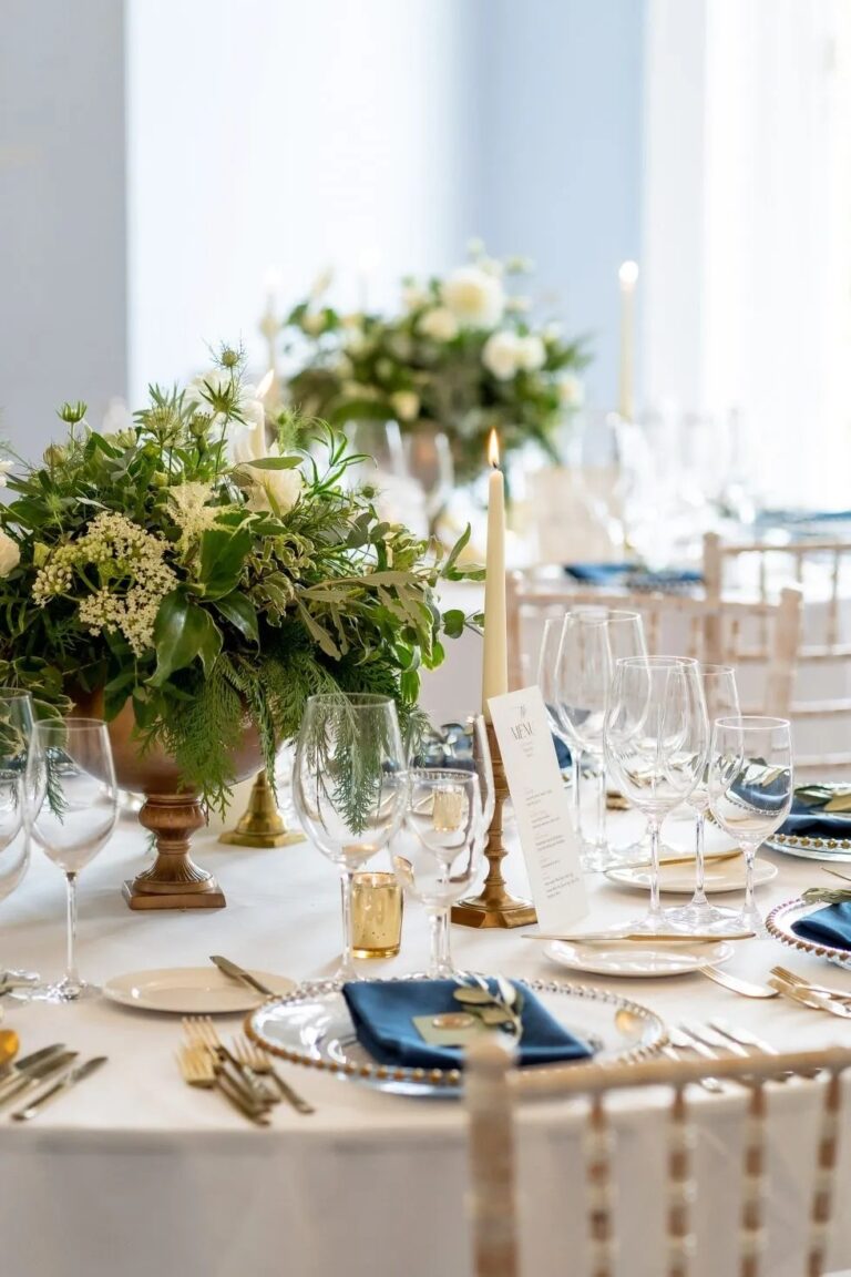 The reception table, gold candlesticks and navy linen, 10-11 Carlton House Terrace, Sweet Pea Floral Design