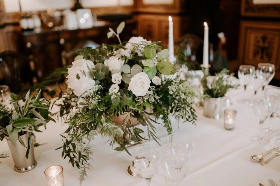 A candlelit reception table, white roses, The Lanesborough, Sweet Pea Floral Design