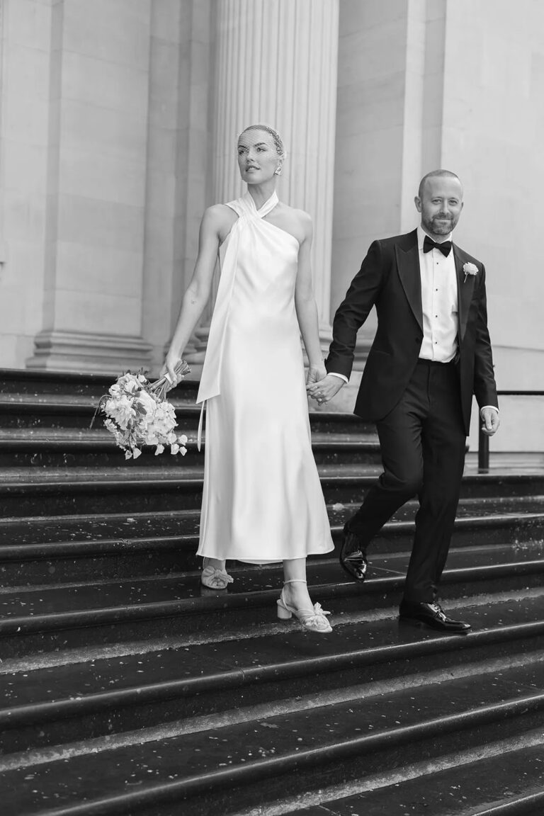 Emily and John descend the steps, The Ned, London, Sweet Pea Floral Design