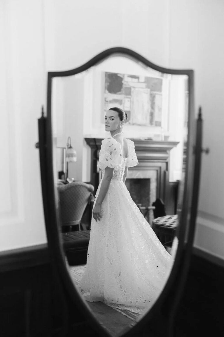 A bridal portrait in the mirror, getting ready at The Ned, Sweet Pea Floral Design