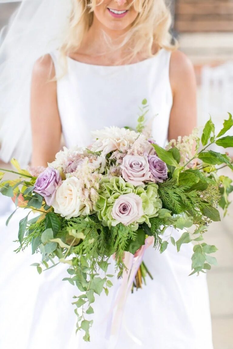 A bridal bouquet of lilac and cream, Gaynes Park, Essex, Sweet Pea Floral Design