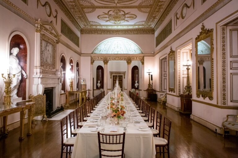 The State Dining Room laid for dinner, Corinthian columns screening the apsed ends, Syon Park