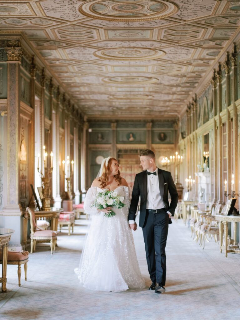 The couple walking the length of Robert Adam's Long Gallery, Syon Park