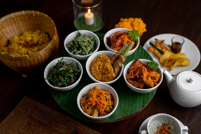 Balinese dishes served on banana leaf, Tanah Gajah, a Resort by Hadiprana