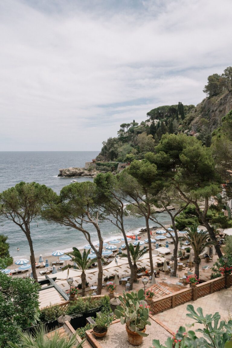 The bay and beach below Taormina through stone pines, Taormina Weddings