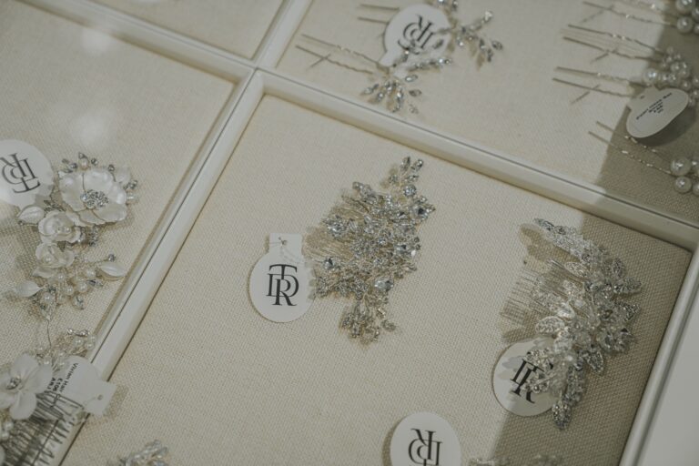 Hair combs and bridal accessories displayed on linen trays with the TDR logo, TDR Bridal