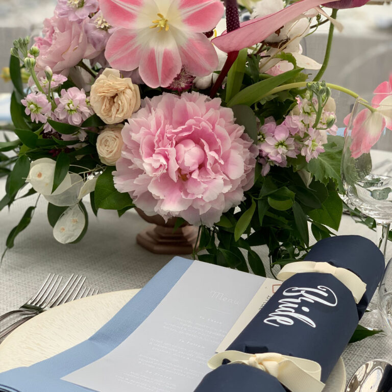 Pink peony table arrangement with a hand-lettered bride place card, The Admirable Crichton