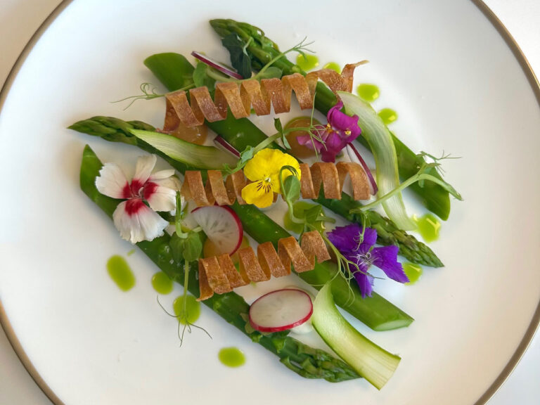 Plated asparagus starter with edible flowers, The Admirable Crichton