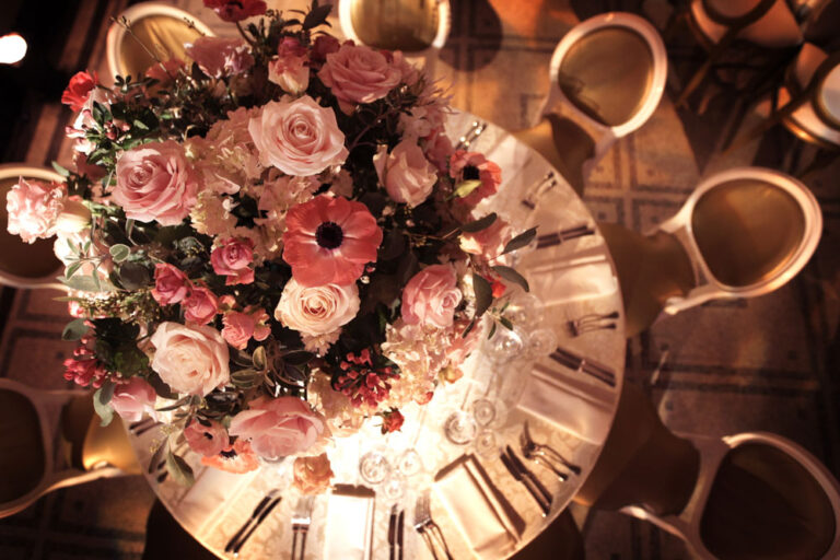 Overhead view of a pink rose table centrepiece, The Admirable Crichton
