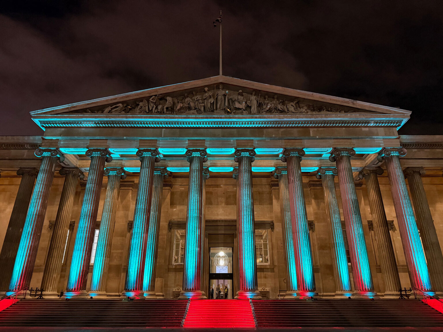 The British Museum lit in teal for an evening event