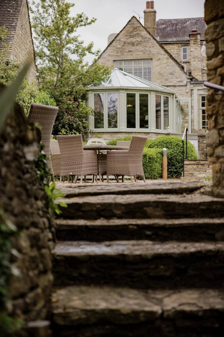 Garden steps rising to the terrace and conservatory, The Bay Tree Hotel
