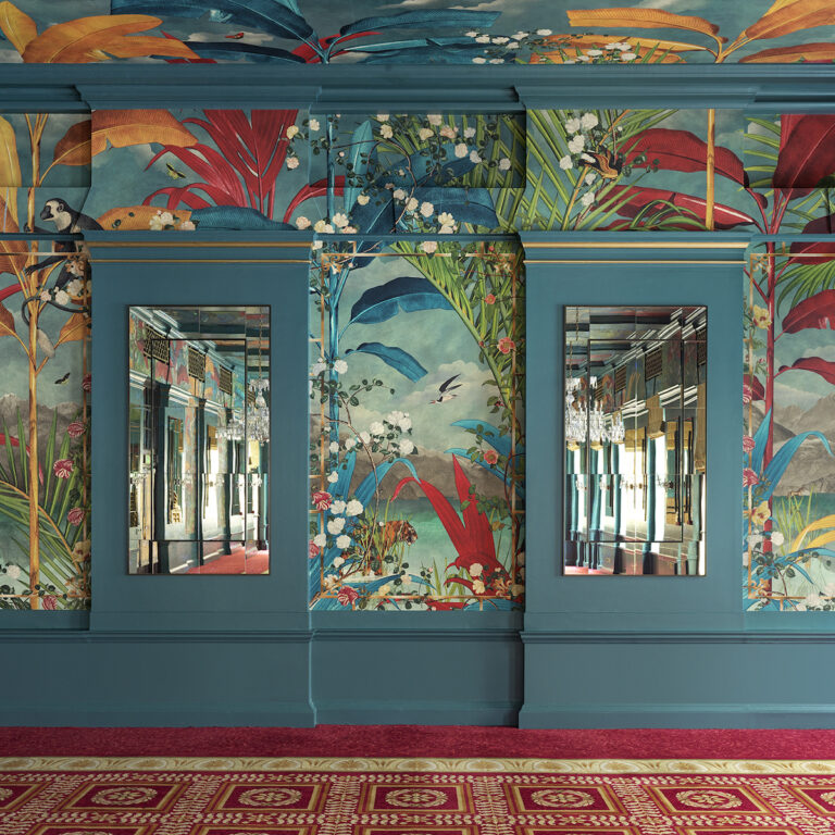 Close view of the George V Hall wall panels, with tropical birds and foliage around mirrored windows, The Bloomsbury