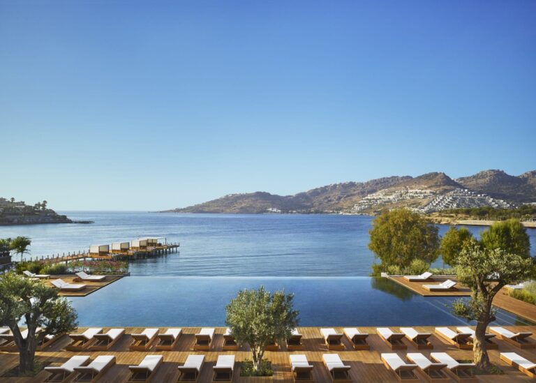 The infinity pool and pier overlooking the bay, The Bodrum Edition