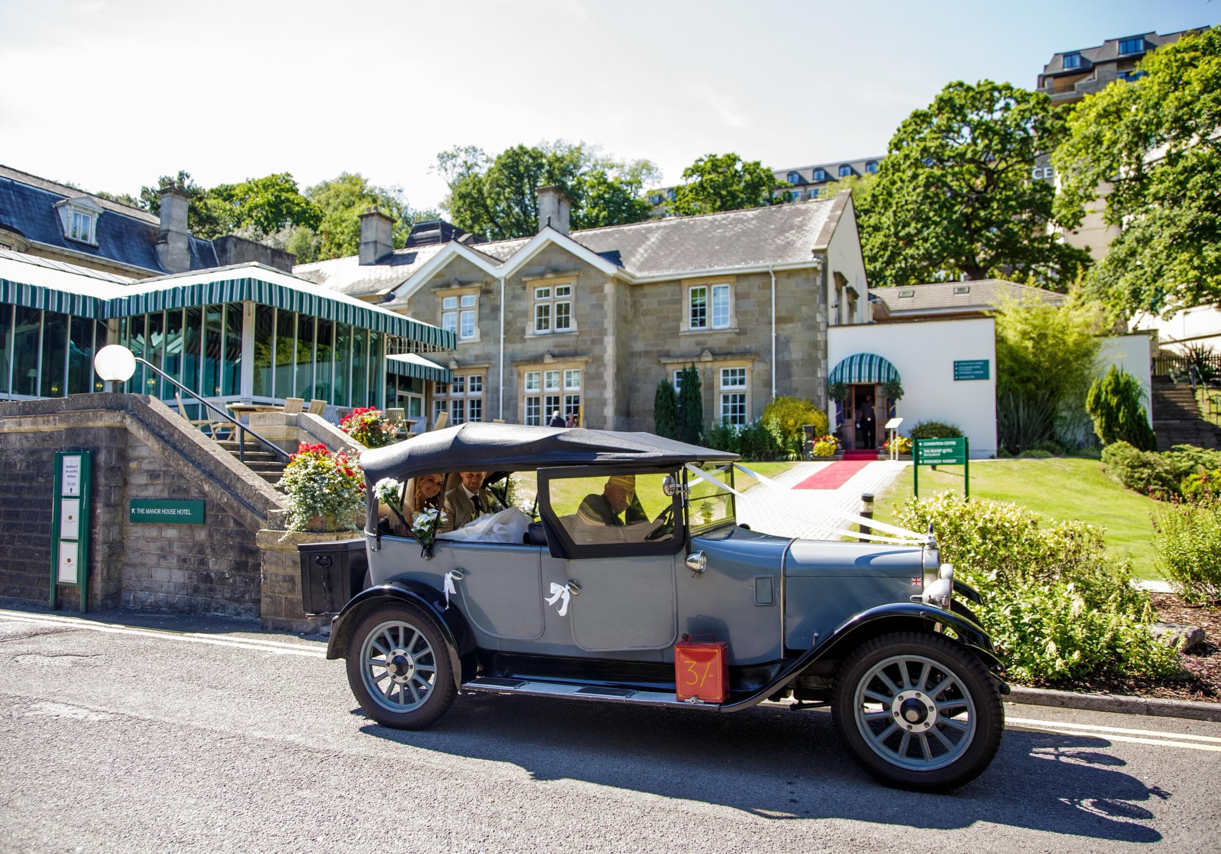 The Manor House with a vintage wedding car, The Celtic Manor Resort