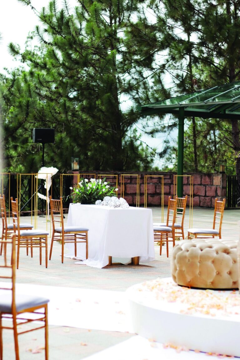 Outdoor ceremony setup on a paved terrace, The Chateau Spa and Organic Wellness Resort