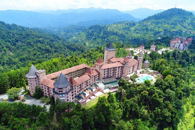 The resort and surrounding forested hills from above, The Chateau Spa and Organic Wellness Resort