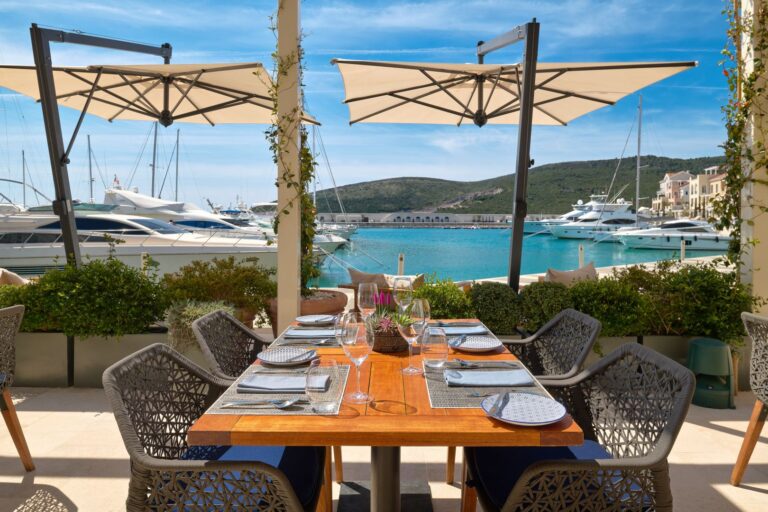 A marina-side terrace table, The Chedi Luštica Bay