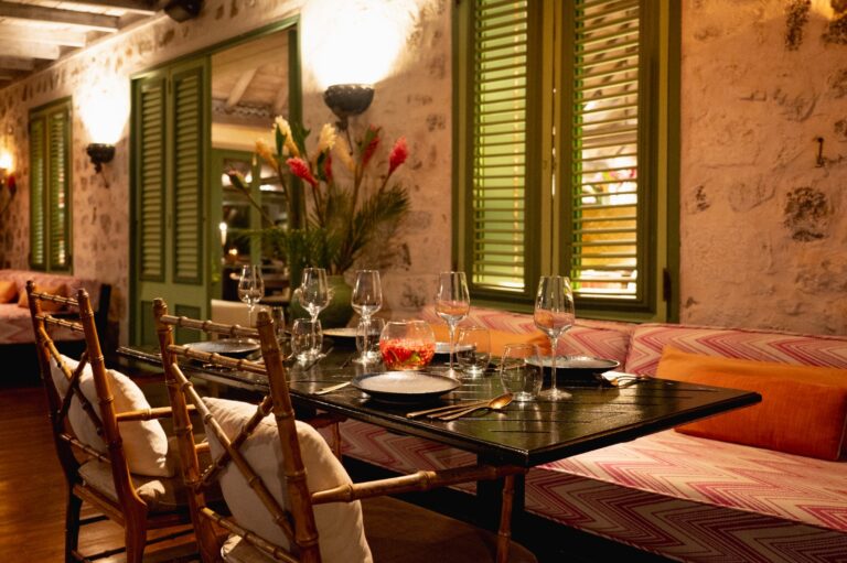 Veranda restaurant dining room, set for dinner, The Cotton House