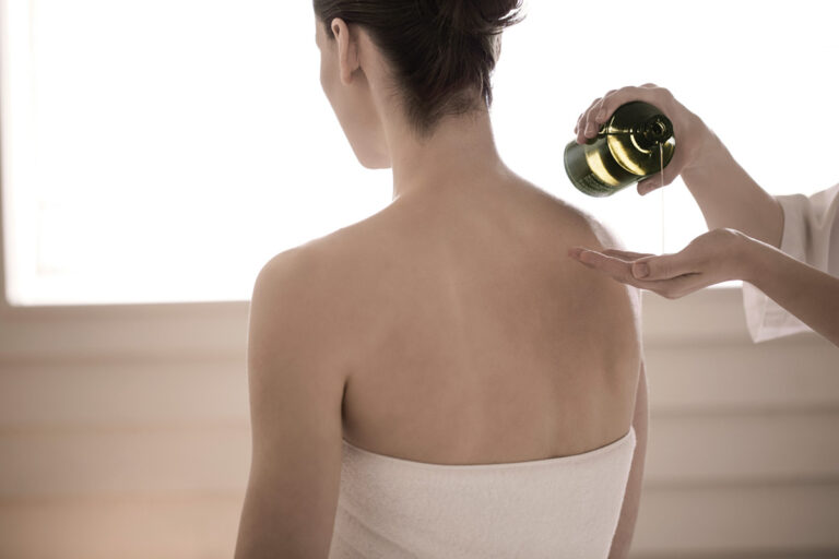 Oil being applied during a spa treatment, The Cotton House