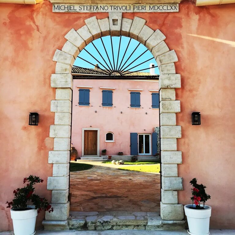 The stone entrance arch dated 1770, The Courti Estate