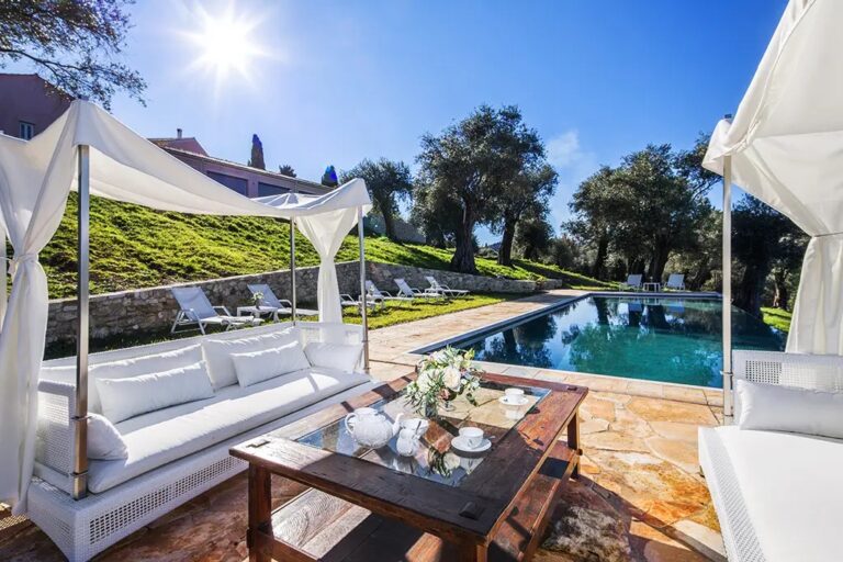 Pool daybeds beside the infinity pool, The Courti Estate