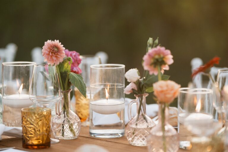 Dahlias, bud vases and amber glass candles on the table, Marche, The Dream Wedding Lab