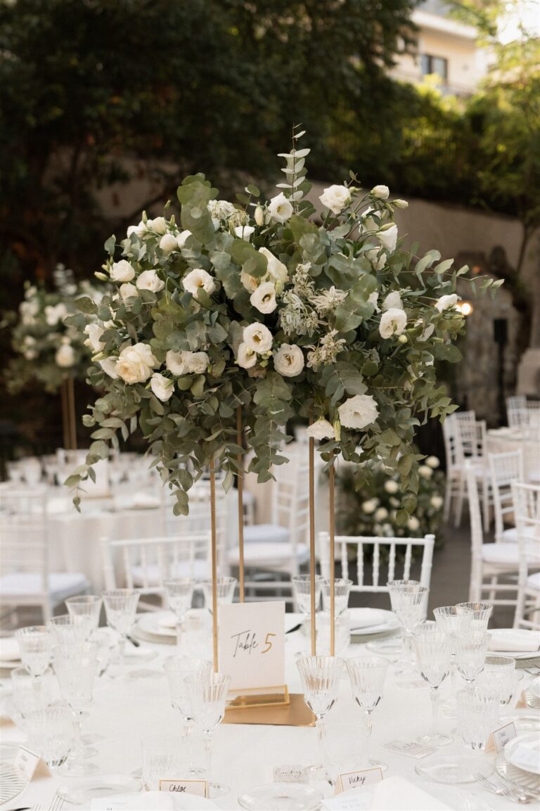 Tall white rose centrepiece over the reception tables, villa in Rome, The Dream Wedding Lab