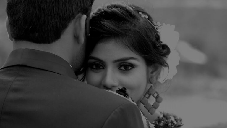 A bride and groom close together in an Indian wedding portrait, in black and white, The Event Studio