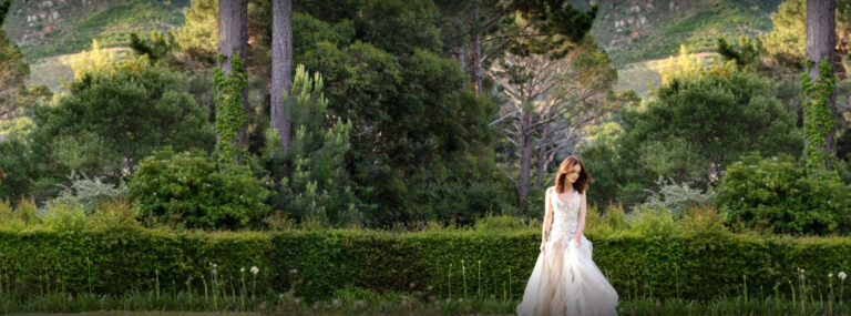 A bride in the clipped-hedge garden, The Forum Embassy Hill