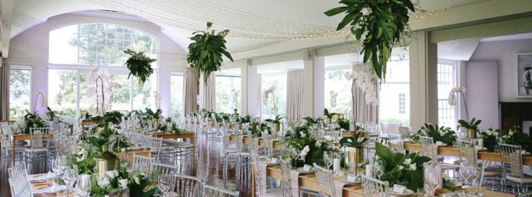 Round tables in the hall with hanging greenery, The Forum Embassy Hill