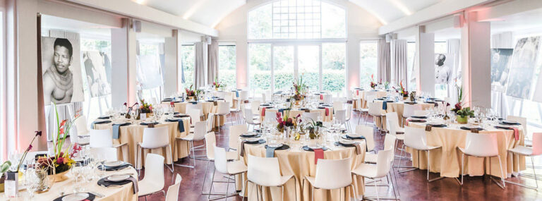 Round tables laid for a seated dinner, The Forum Embassy Hill