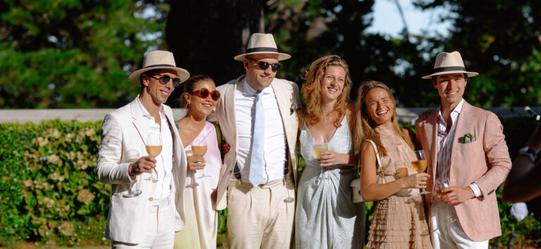 Guests in linen suits at a garden celebration, The Forum Embassy Hill