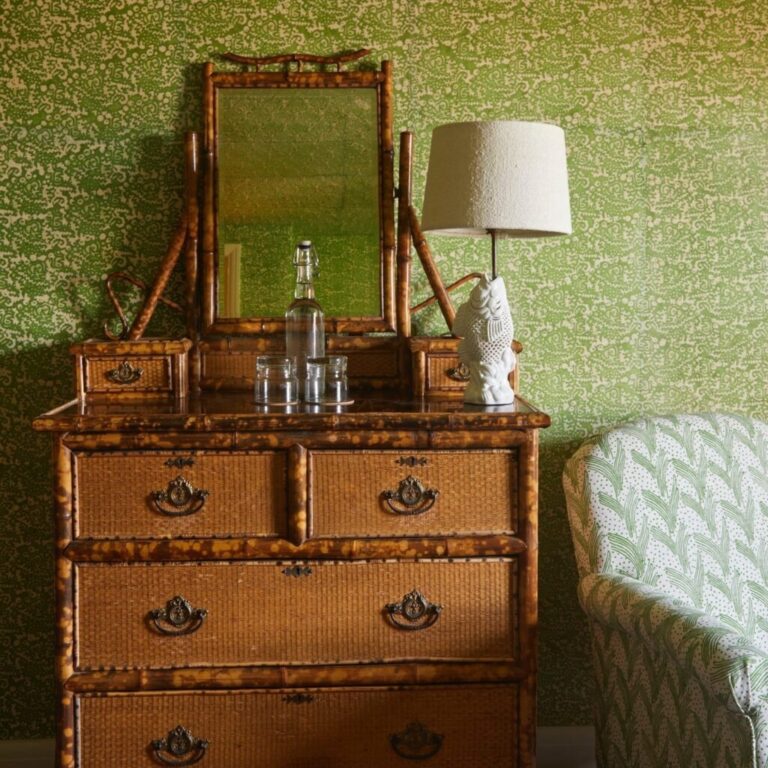 A bamboo dresser and lamp in a George bedroom, The George in Rye