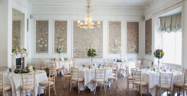 The 16th-century Long Room set for an intimate wedding breakfast, The George in Rye