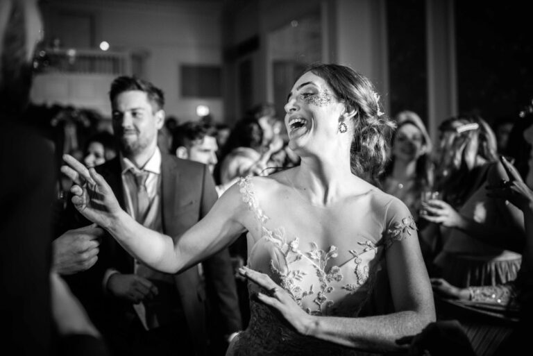 A couple dancing among their guests, The George in Rye