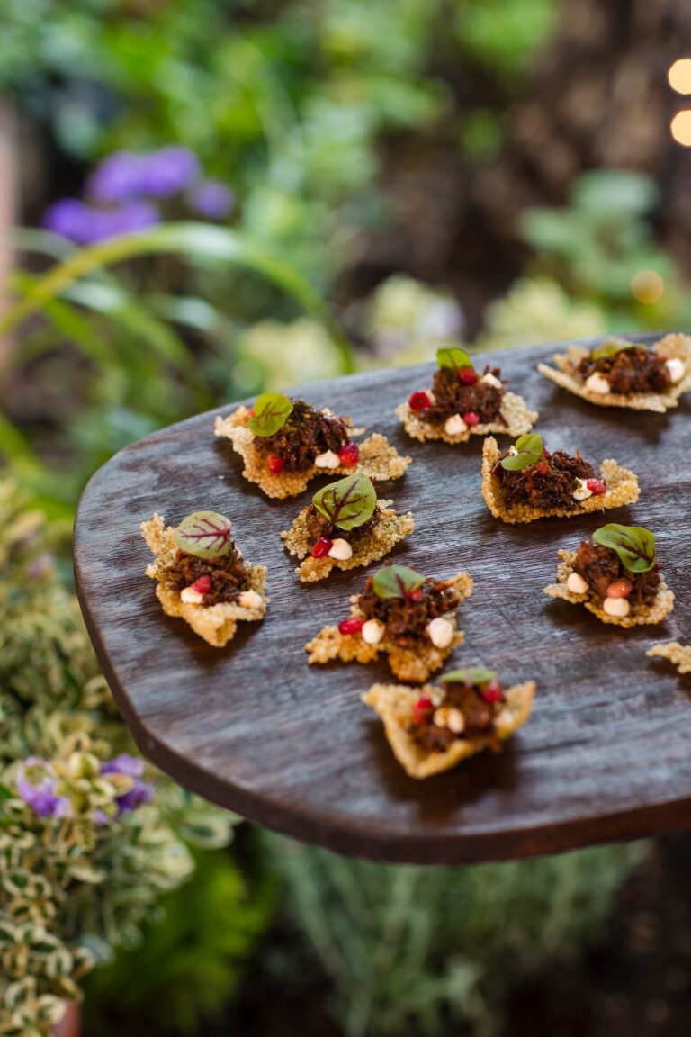 Canapes on a dark wooden board, The Greenhouses